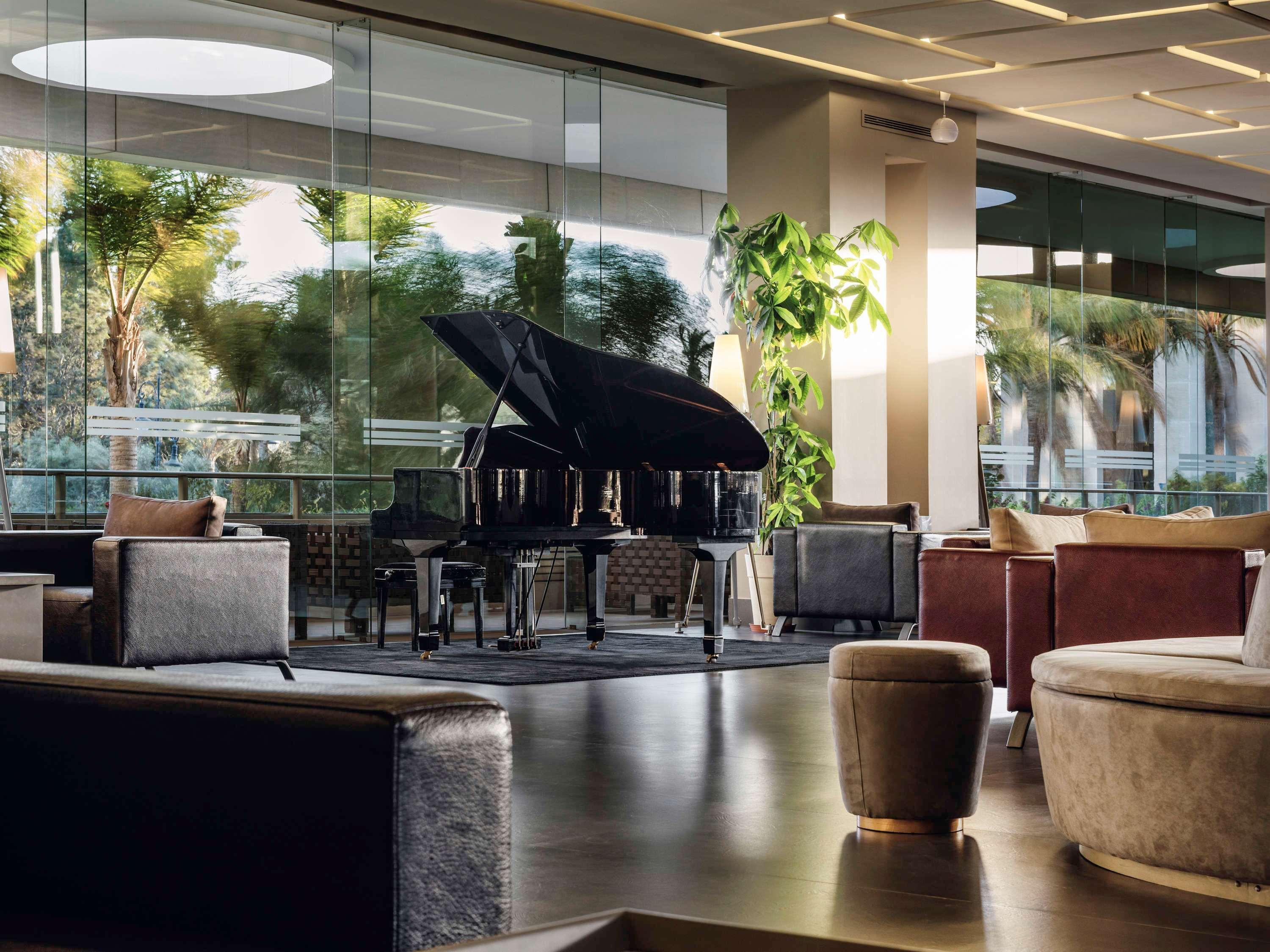 뫼밴픽 호텔 앤 카지노 말라바타 탕헤르 외부 사진 The lobby of the hotel